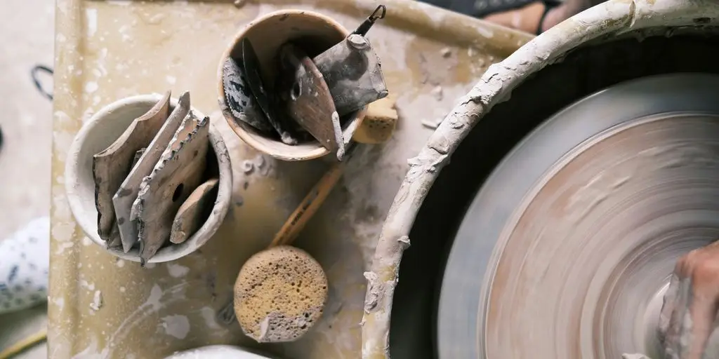 Close up of pottery wheel and tools